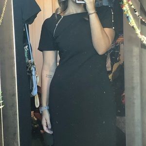 Classy black dress. Pearls on the shoulders